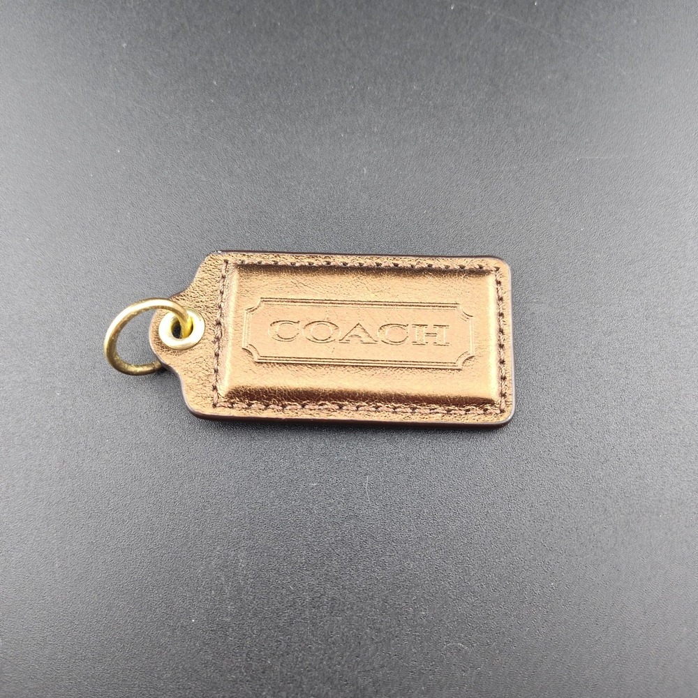 Coach bag purse tag keychain charm metallic bronze brown